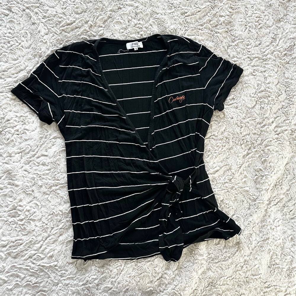 Striped tee with orange cowboys logo
